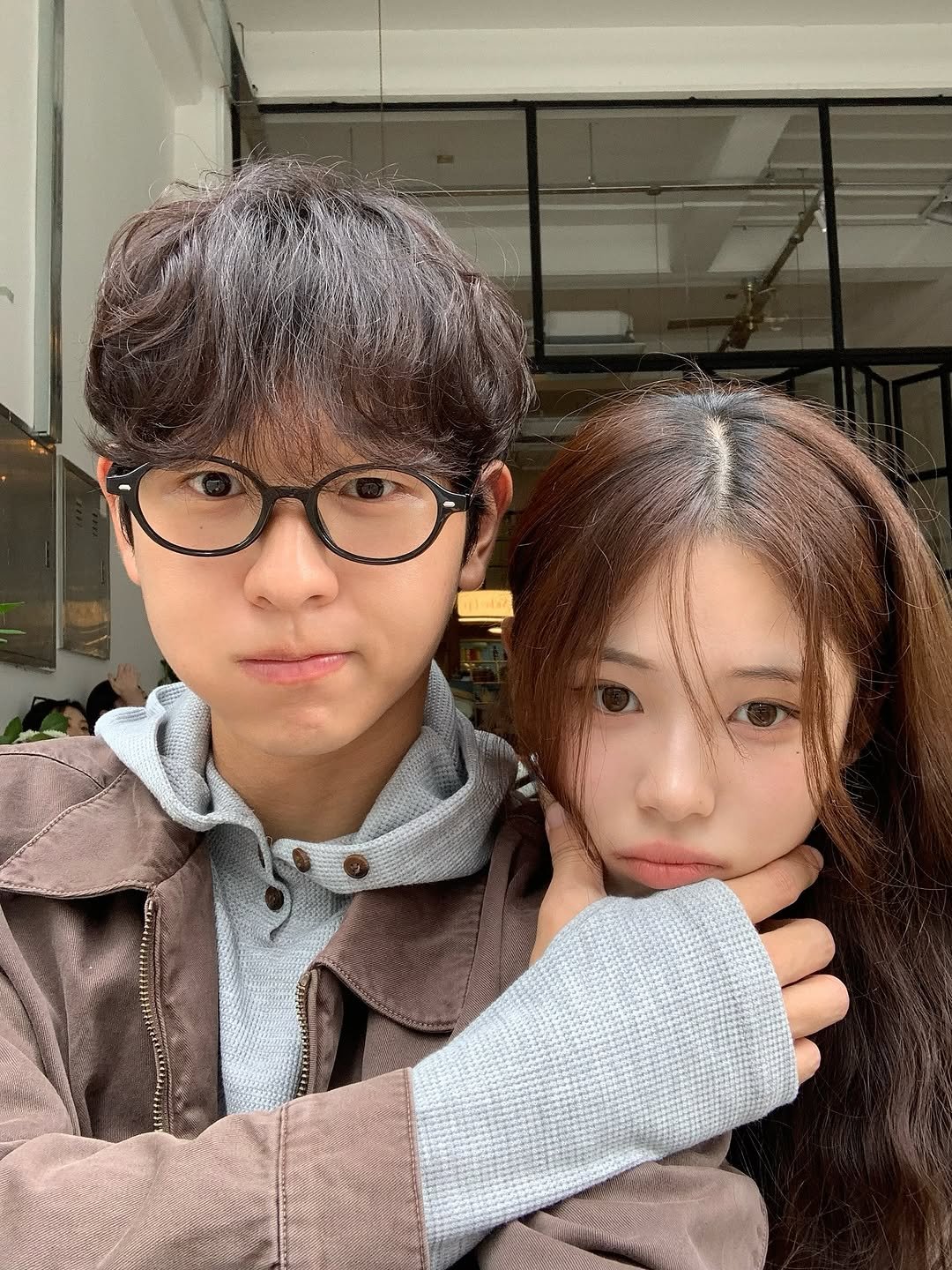 Photo shared by 안민서 on September 29, 2025 tagging @waiji_poo. May be an image of one or more people, hair, duffle coat, eyeglasses, parka and text.