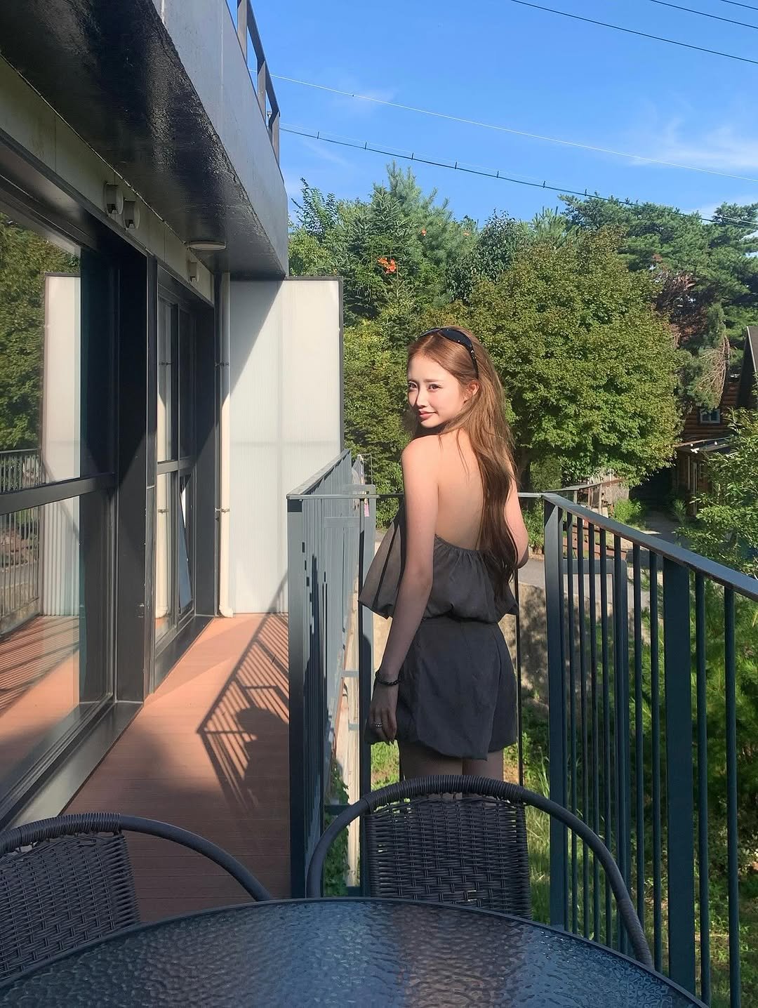 Photo by 서진♡︎ on August 12, 2025. May be an image of 1 person, sundress and text.