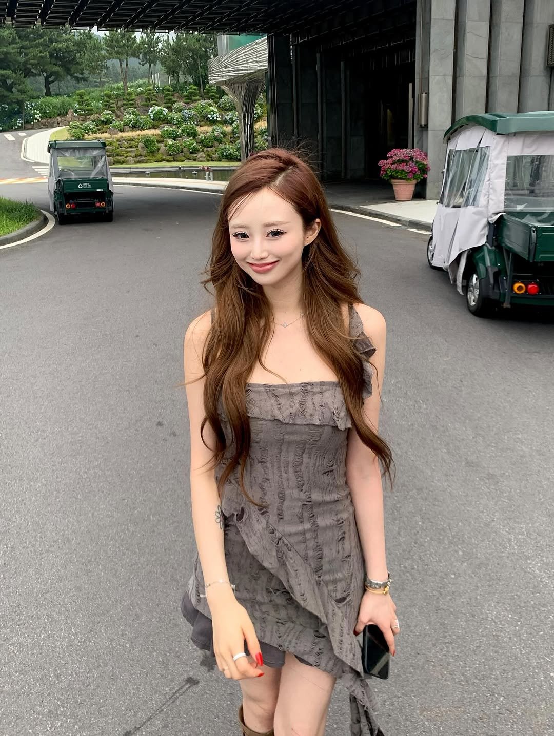 Photo by 서진♡︎ on July 14, 2025. May be an image of 1 person, hair, sundress, dress and text.