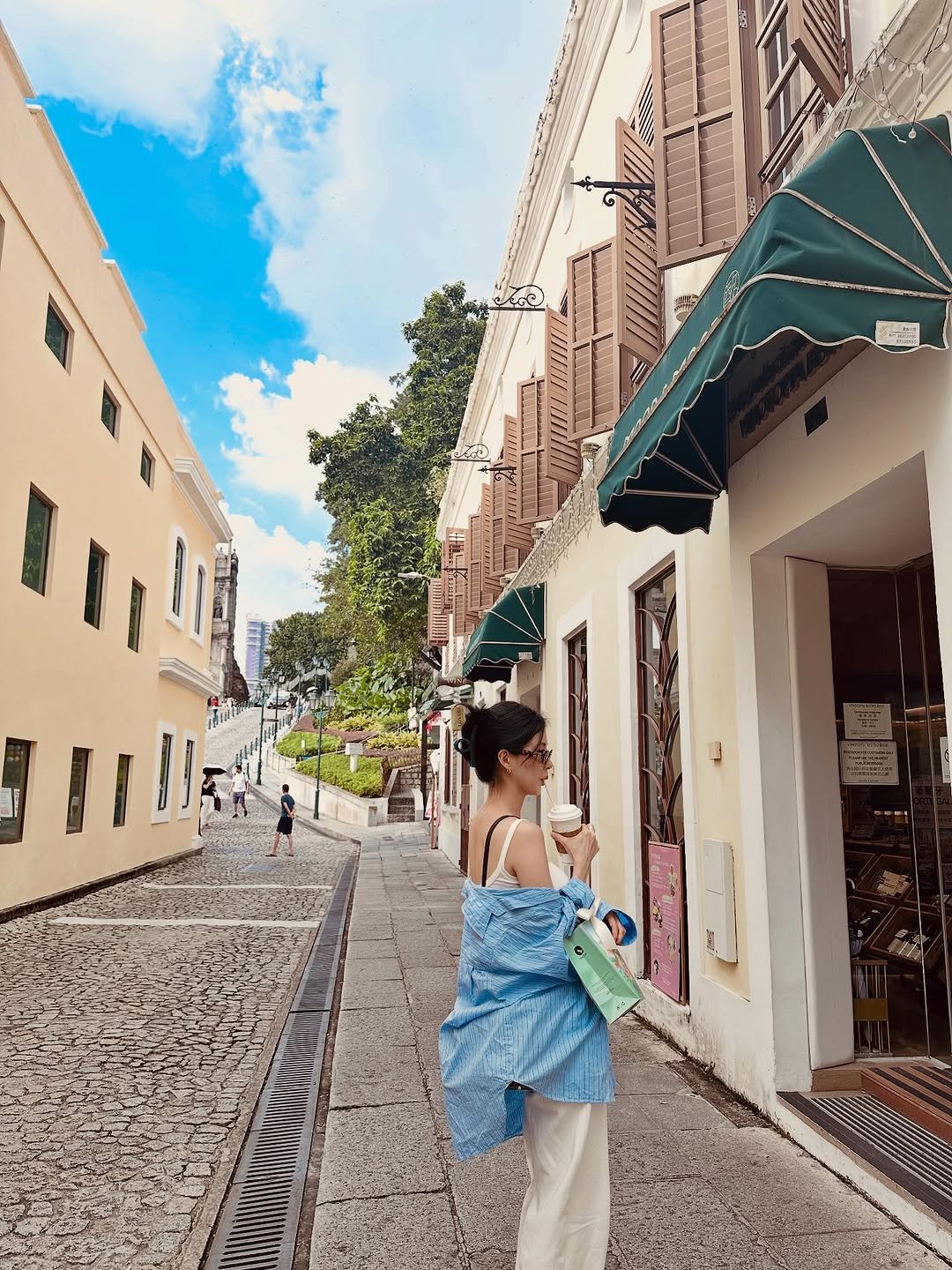 Photo by SEOHYUN on October 12, 2025. May be an image of headscarf, cornflower, street and text.