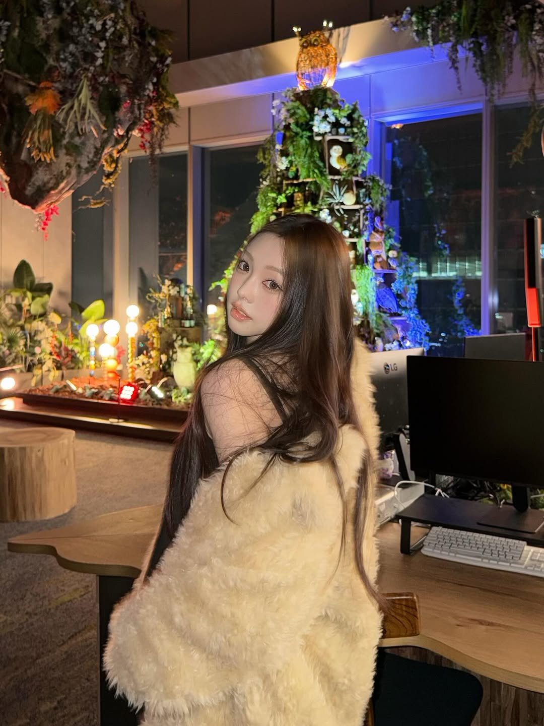 Photo shared by 김선우 on December 15, 2025 tagging @galaxycorporation.official. May be an image of one or more people, hair, sable coat, parka and text.