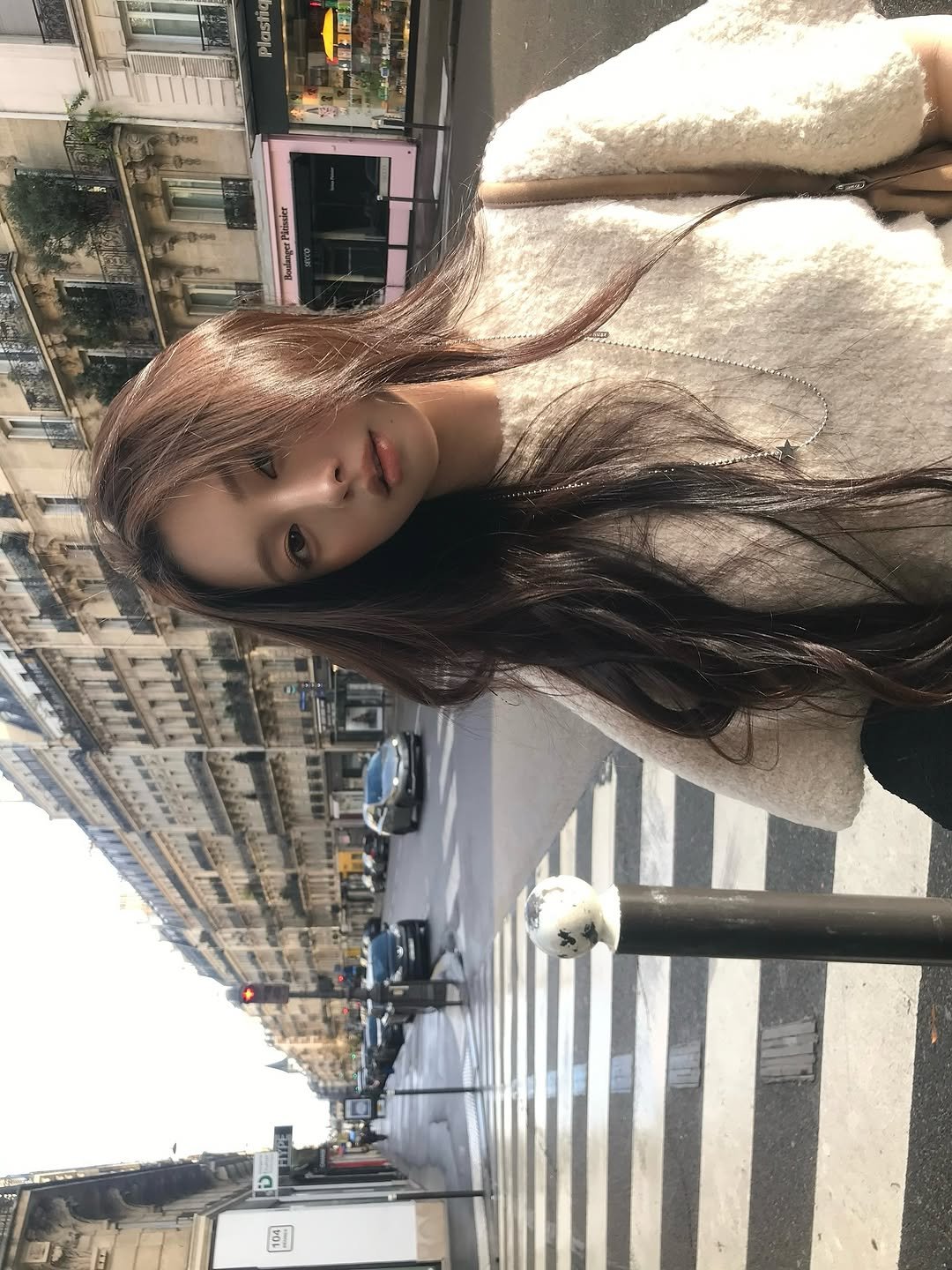 Photo by 김선우 on October 29, 2025. May be an image of one or more people, hair, street and text.