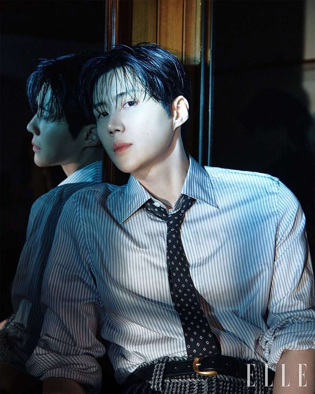 Photo shared by 김선호 on January 27, 2026 tagging @ellekorea. May be an image of bolo tie and text that says 'ELLE'.