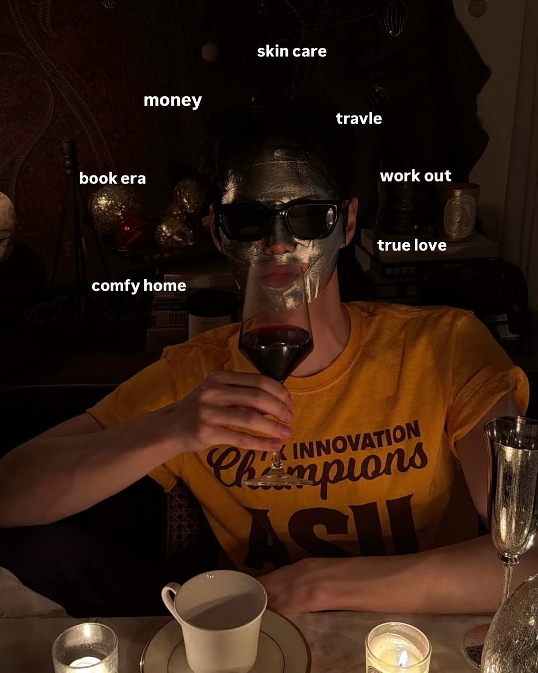 Photo by 정선혁 Seon Hyeok on December 19, 2025. May be an image of drink, face mask, tinfoil, magazine, poster, wine bottle and text that says 'skincare skin care money travle book bookera era work workout out comfyhome comfy home true truelove love INNOVATION mprars TpoЛO'.