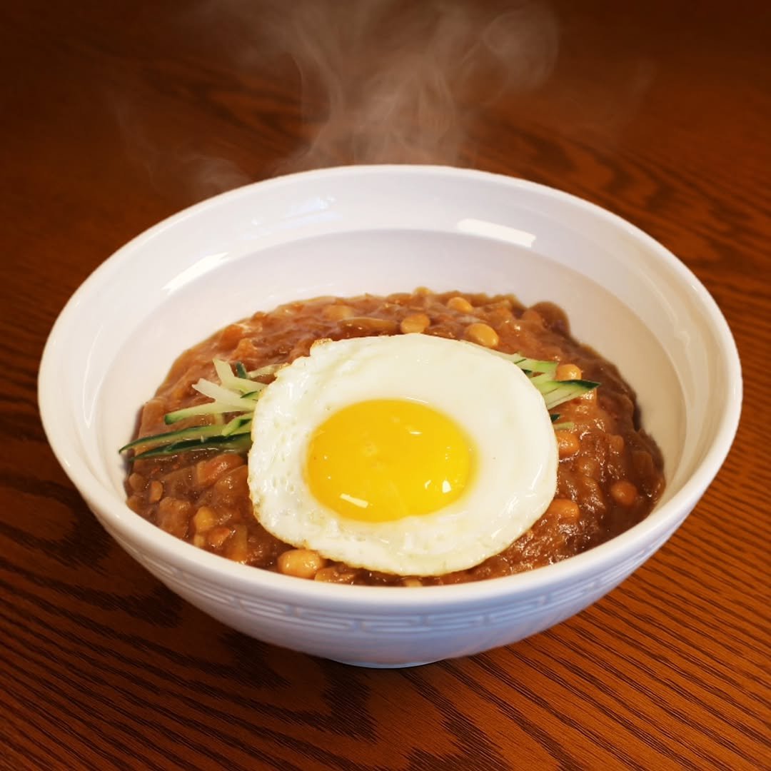 Photo by 서룡 | 마포구 상암동 중식당, 중국집 중화요리 맛집 in 서룡. May be an image of congee, egg yolk, poached egg, stew, lentils and text.