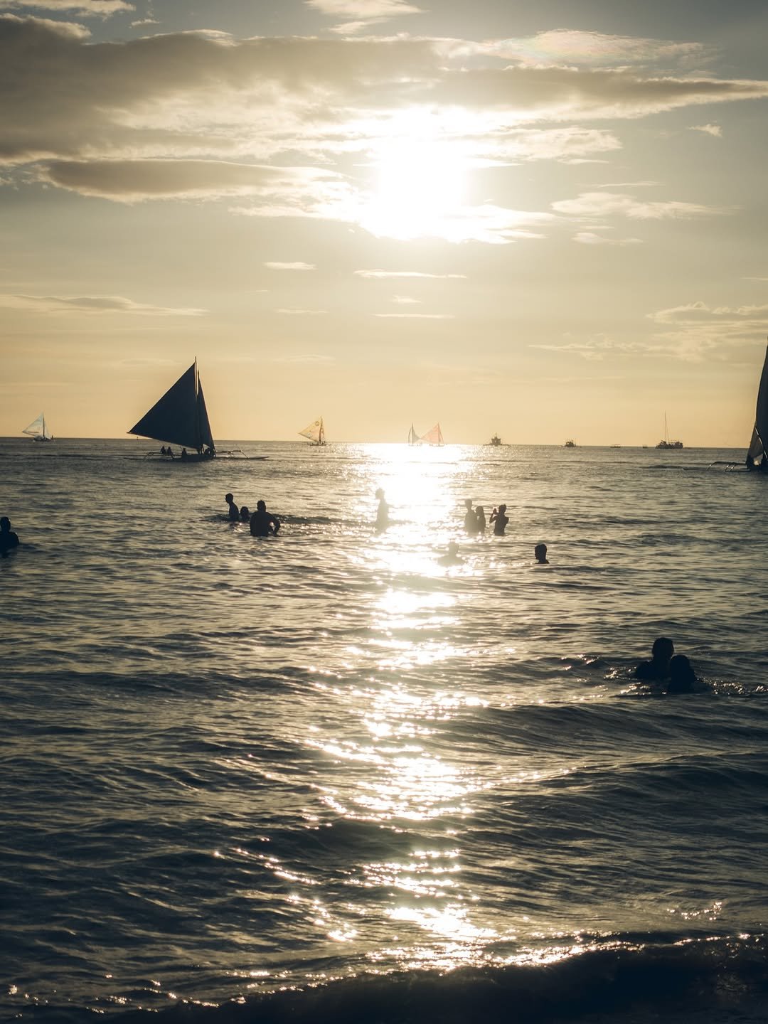 Photo by Lovely B on August 13, 2025. May be an image of 2 people, sail, boat, water and text.