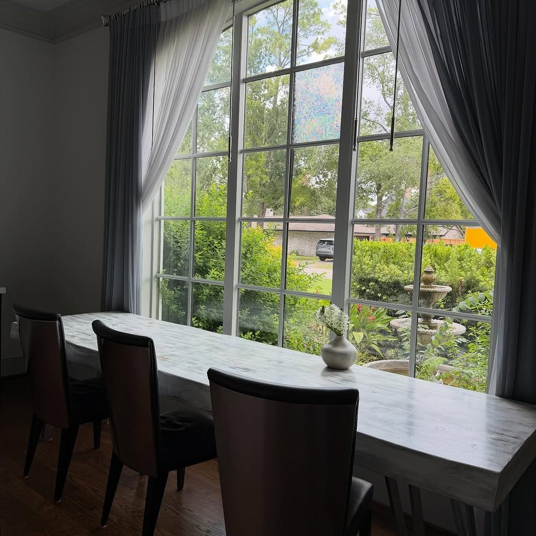 Photo by Jim Kim on September 24, 2025. May be an image of curtains, dining table, indoors, window and text.