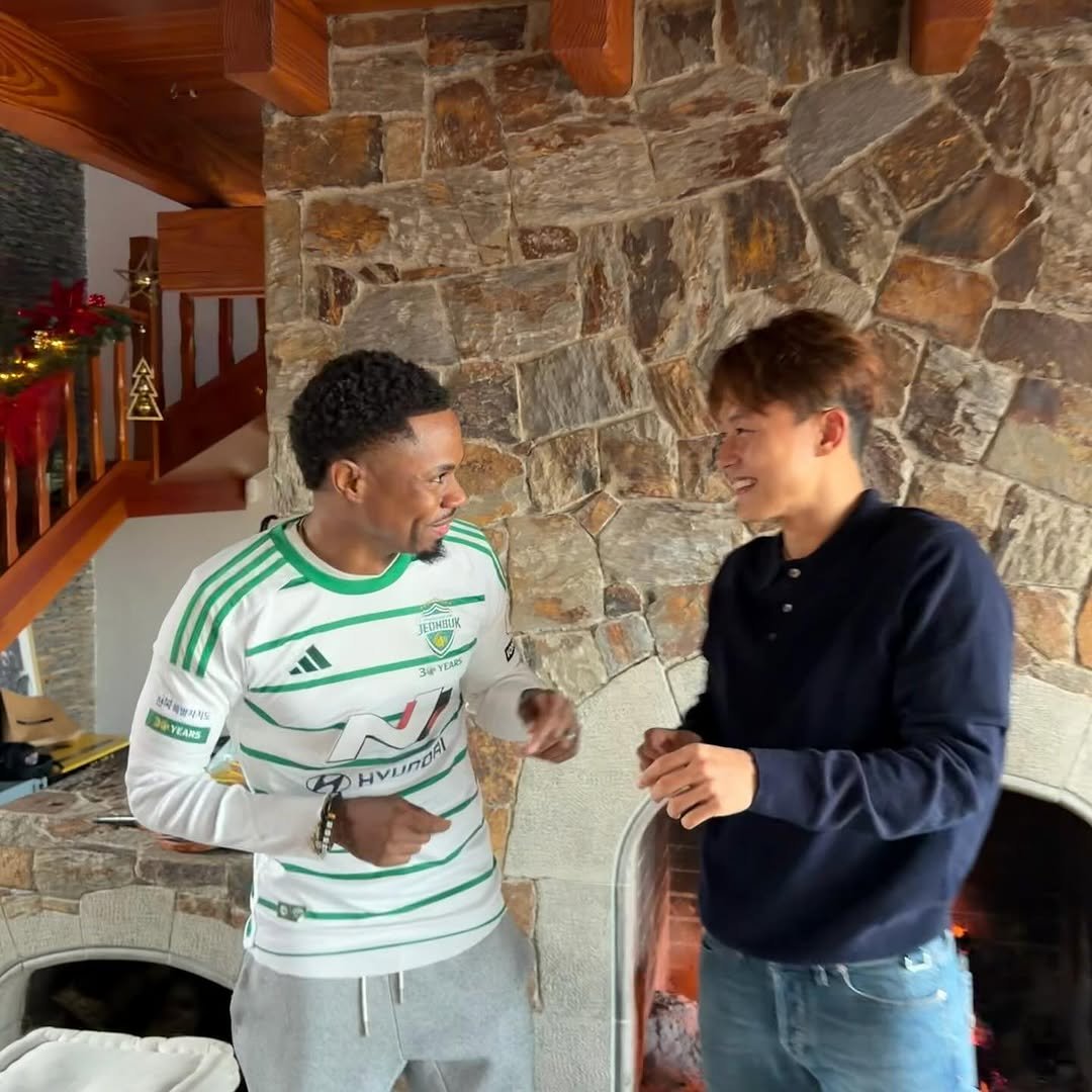 Photo by SW 🇰🇷 이승우 on January 01, 2026. May be an image of football, standing, sweater, fireplace and text.