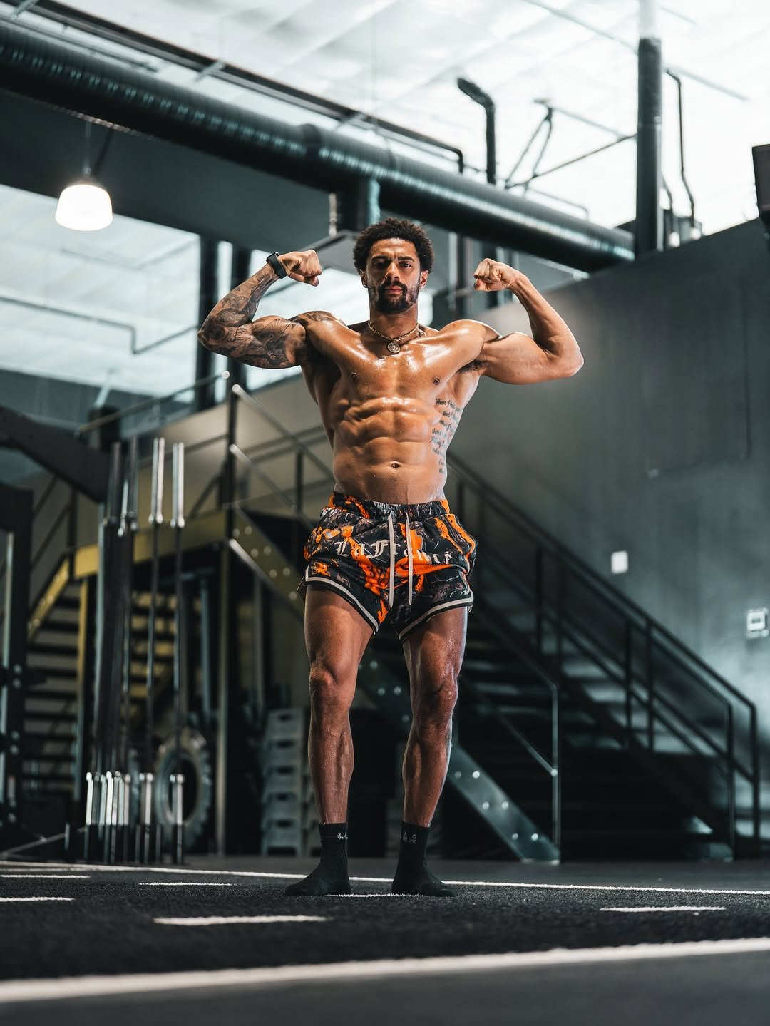 Photo by SHAI ROSS | Winnipeg Fitness📍 on December 30, 2025. May be an image of one or more people, biceps, people bodybuilding, activewear, punching bag, shorts, sportswear and text.