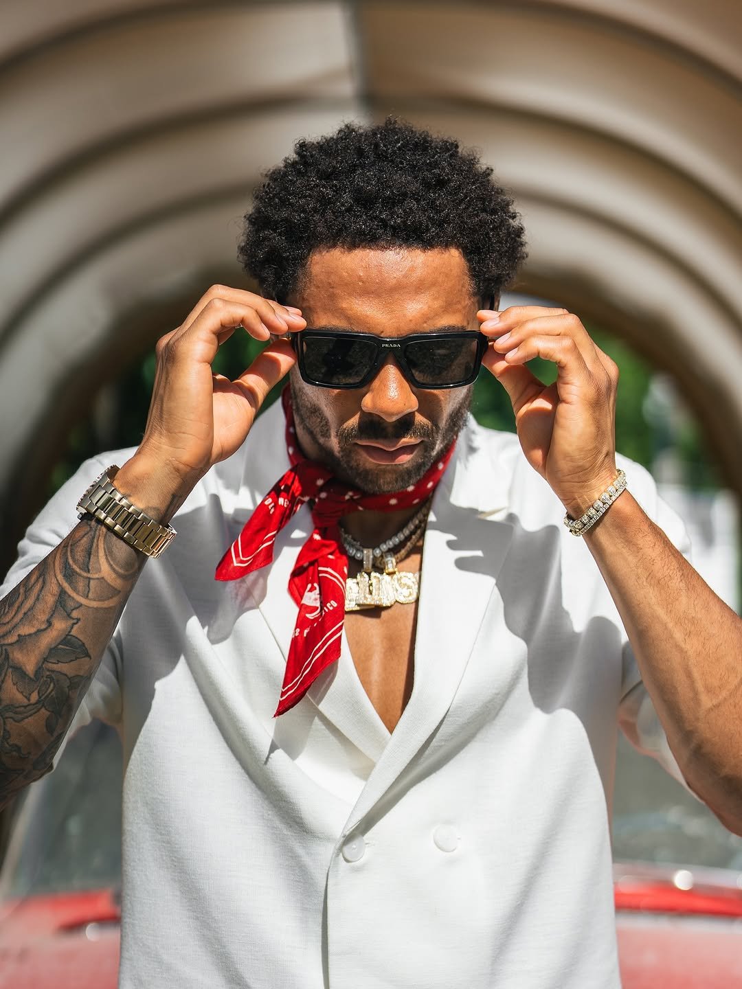 Photo by SHAI ROSS | Winnipeg Fitness📍 on August 21, 2025. May be an image of 1 person, wrist watch, neckwear, bandanna, blazer, sunglasses and text.