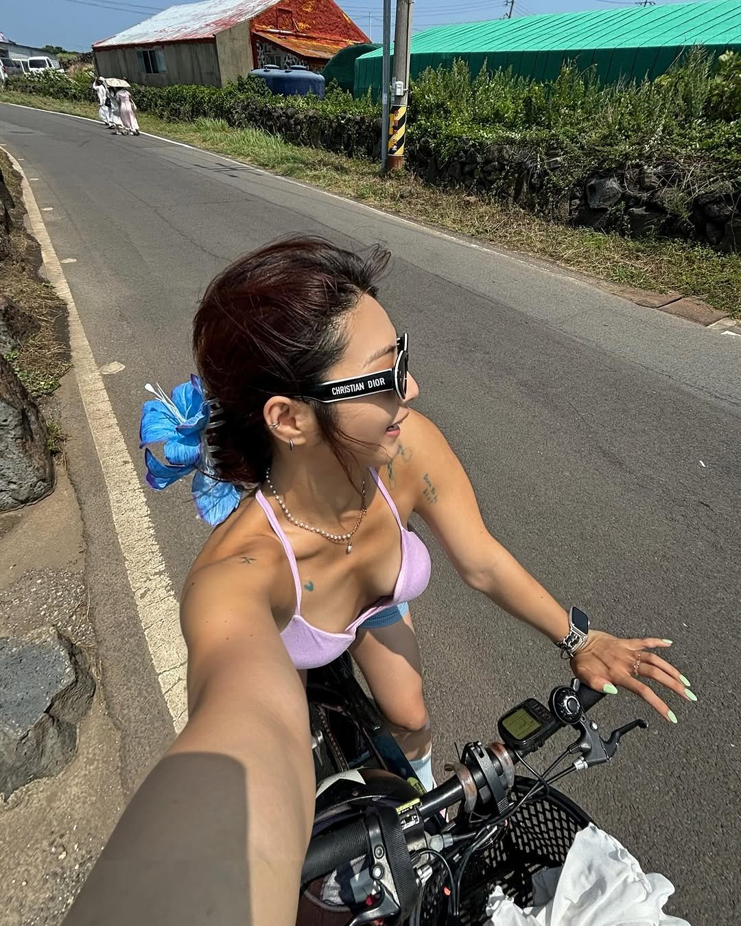 Photo shared by 이가효 on July 19, 2025 tagging @positiveme.official. May be an image of bicycle, scooter and road.