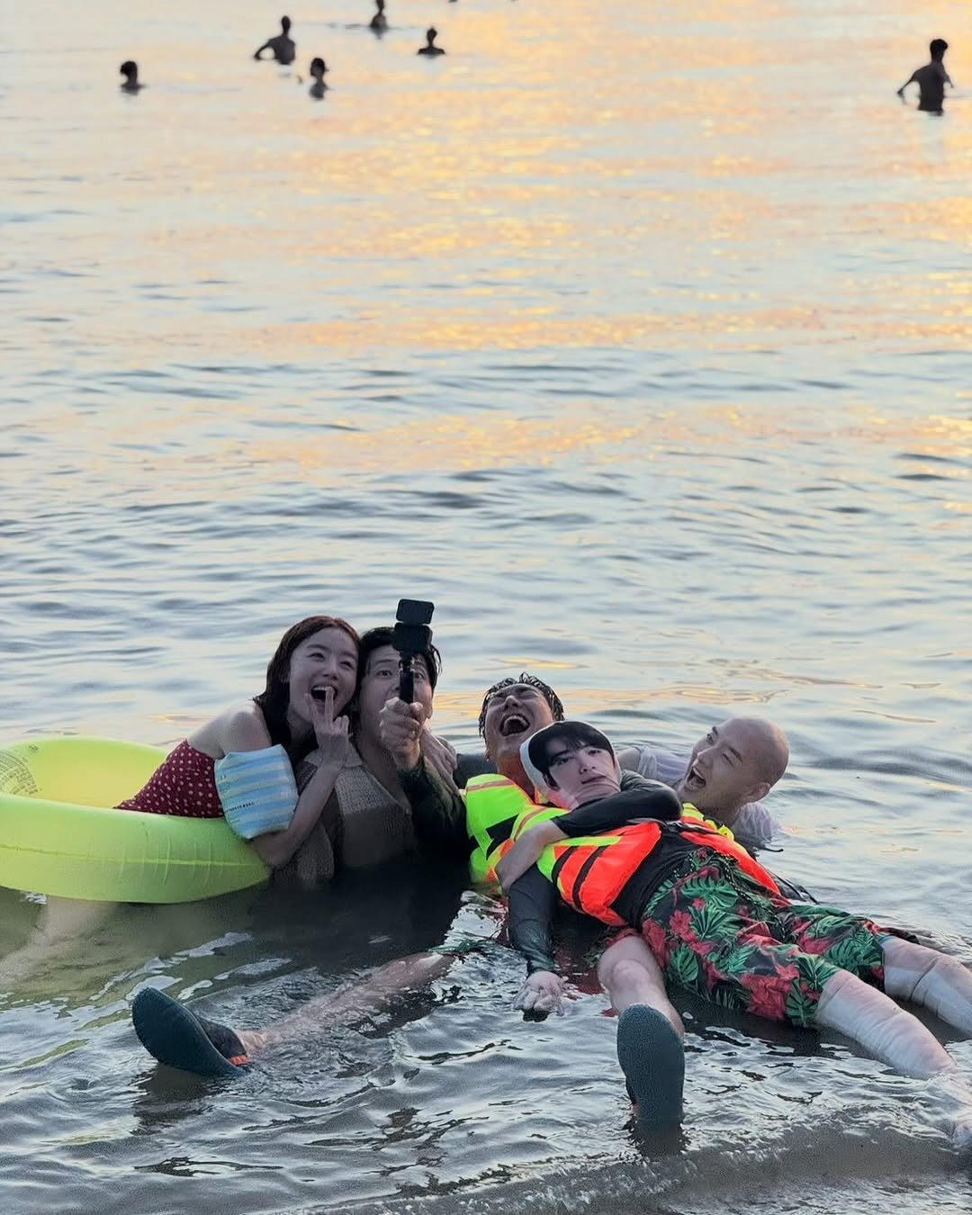 Photo shared by shh daily on October 18, 2025 tagging @showbox.movie. May be an image of swimming, raft, body of water and text.