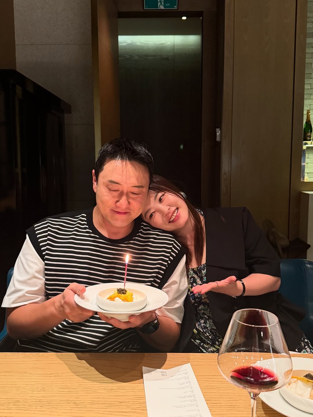 Photo shared by 개그우먼 심진화🌷 on July 16, 2025 tagging @wonhyo0925. May be an image of 2 people, food, candle and text.