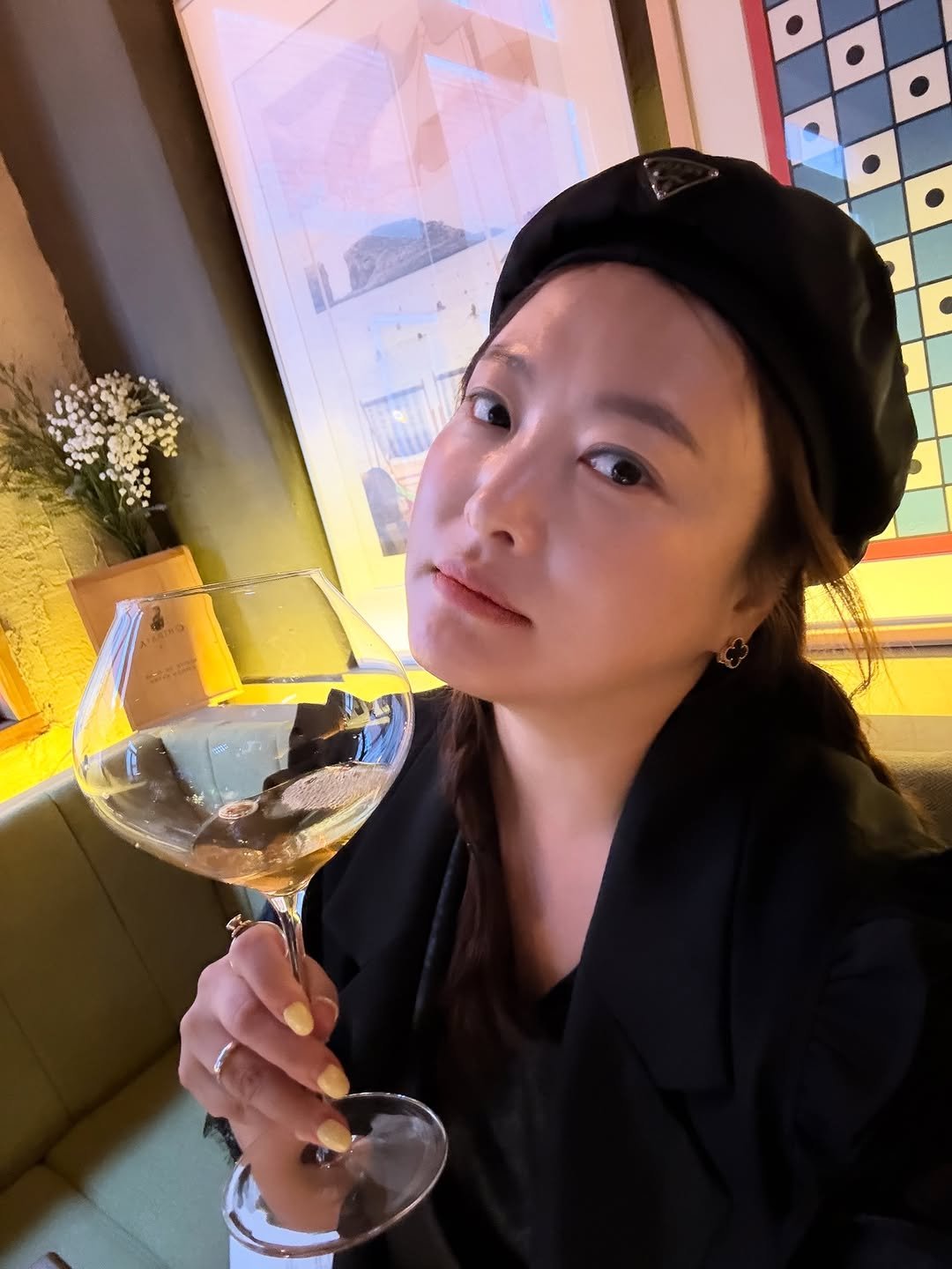 Photo by 개그우먼 심진화🌷 on September 29, 2025. May be an image of 1 person, duffle coat, champagne, beret, wine glass and text.