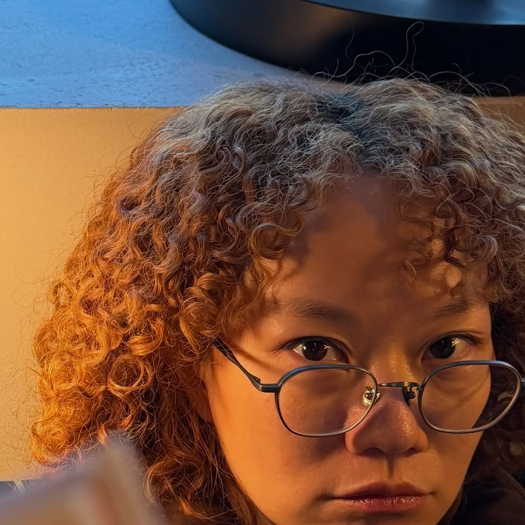 Photo by 김신혜 on January 16, 2026. May be an image of studying, eyeglasses, money and text.