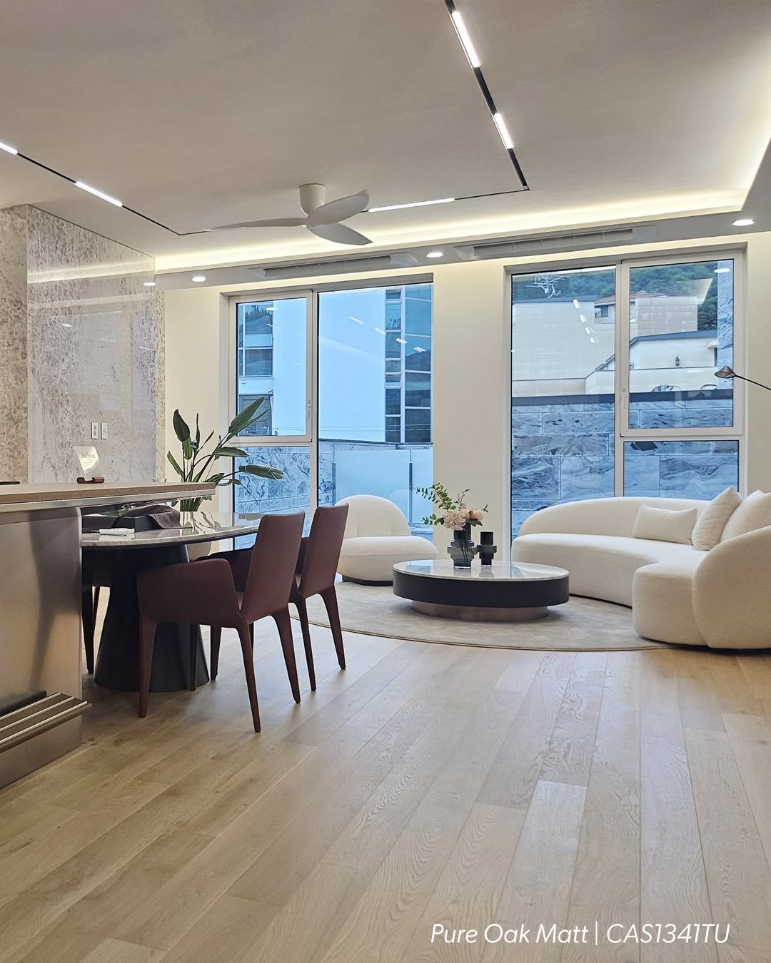 Photo by 퀵스텝 마루 on October 22, 2025. May be an image of lighting, dining table, sofa, living room, indoors and text that says 'Pure PureOakMatt| ureOakMatt|CAS1341TU Oak Matt CAS1341TU'.