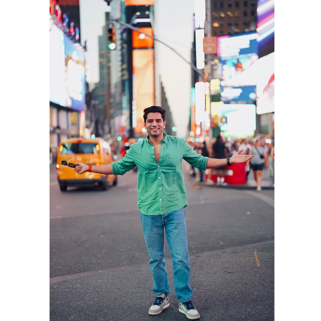 Photo by Shivam malik on August 09, 2025. May be an image of 3 people and Times Square.