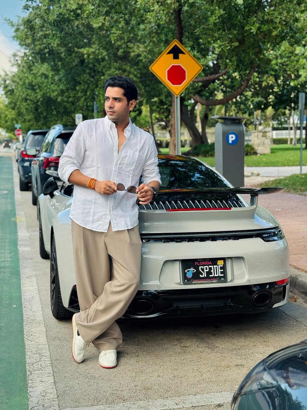 Photo by Shivam malik on August 12, 2025. May be an image of 2 people, wrist watch, car, road and text.