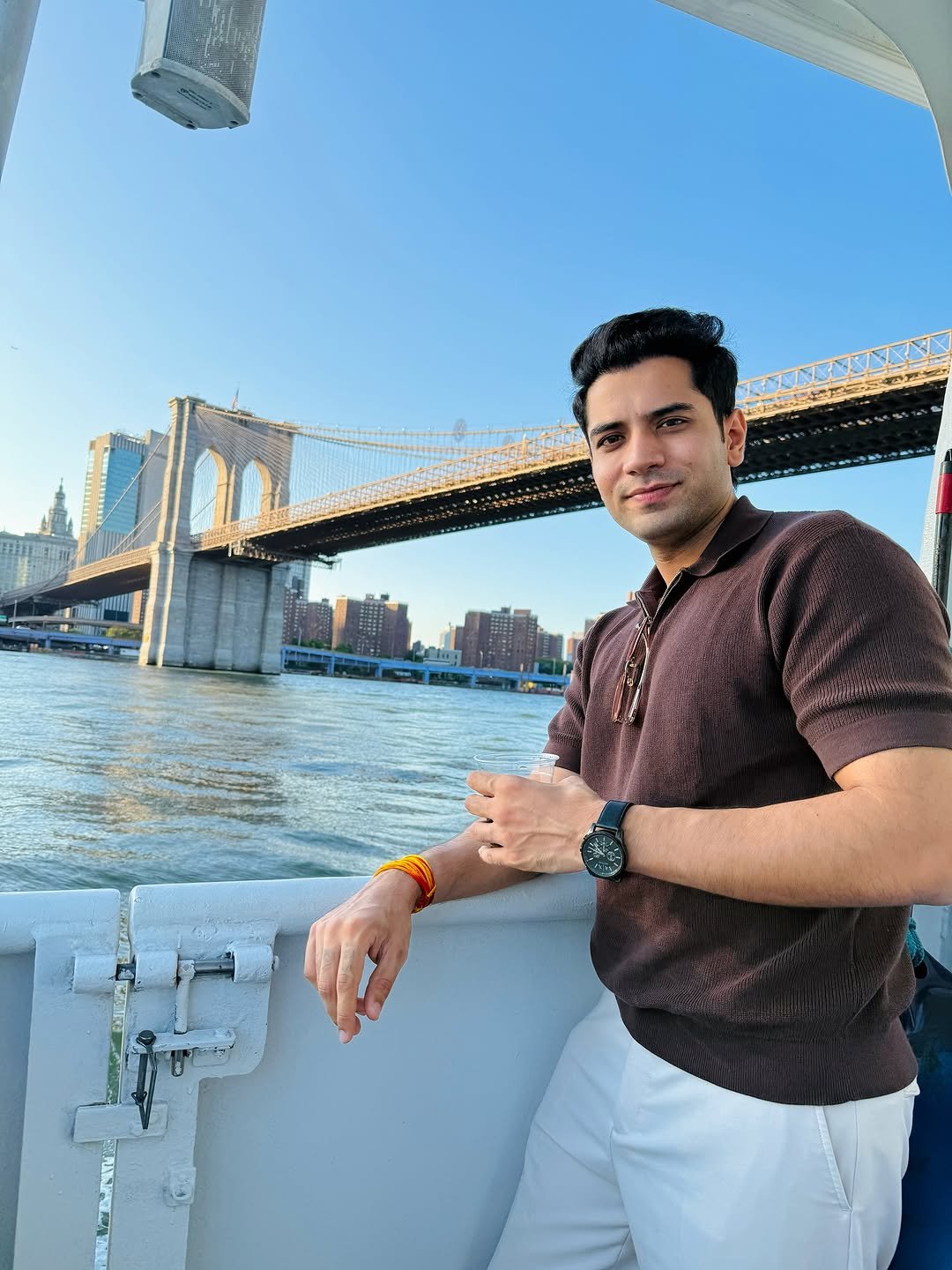 Photo by Shivam malik on September 24, 2025. May be an image of 1 person, boat, the Brooklyn Bridge and text.