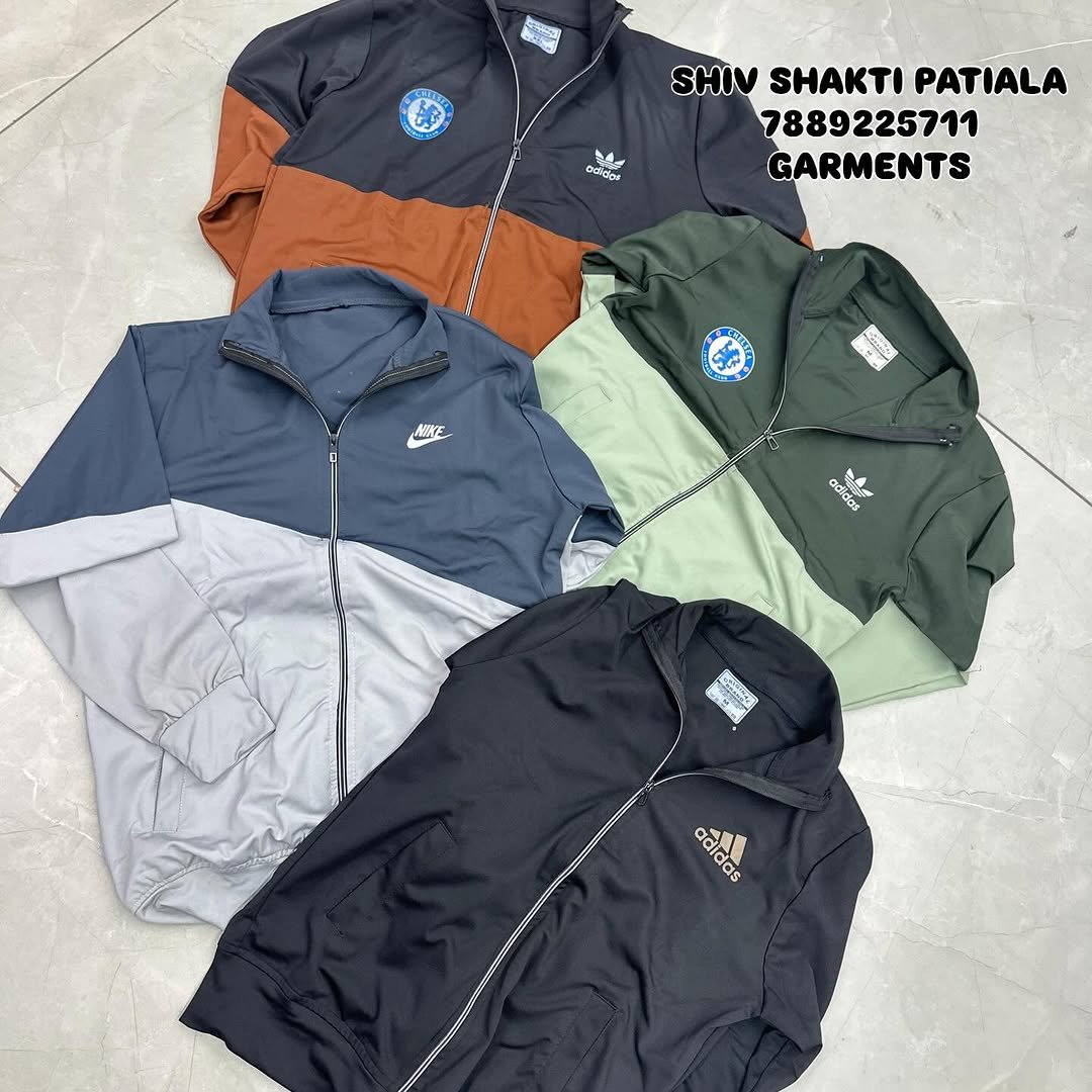 Photo by SHIV SHAKTI PATIALA GARMENTS in Bholla collection. May be an image of fleece, jacket, raincoat, parka and text that says '고 マば Ovdaioa SHIV SHAKTI PATIALA 7889225711 GARMENTS NOYE adidas dida Sp adidas addas'.
