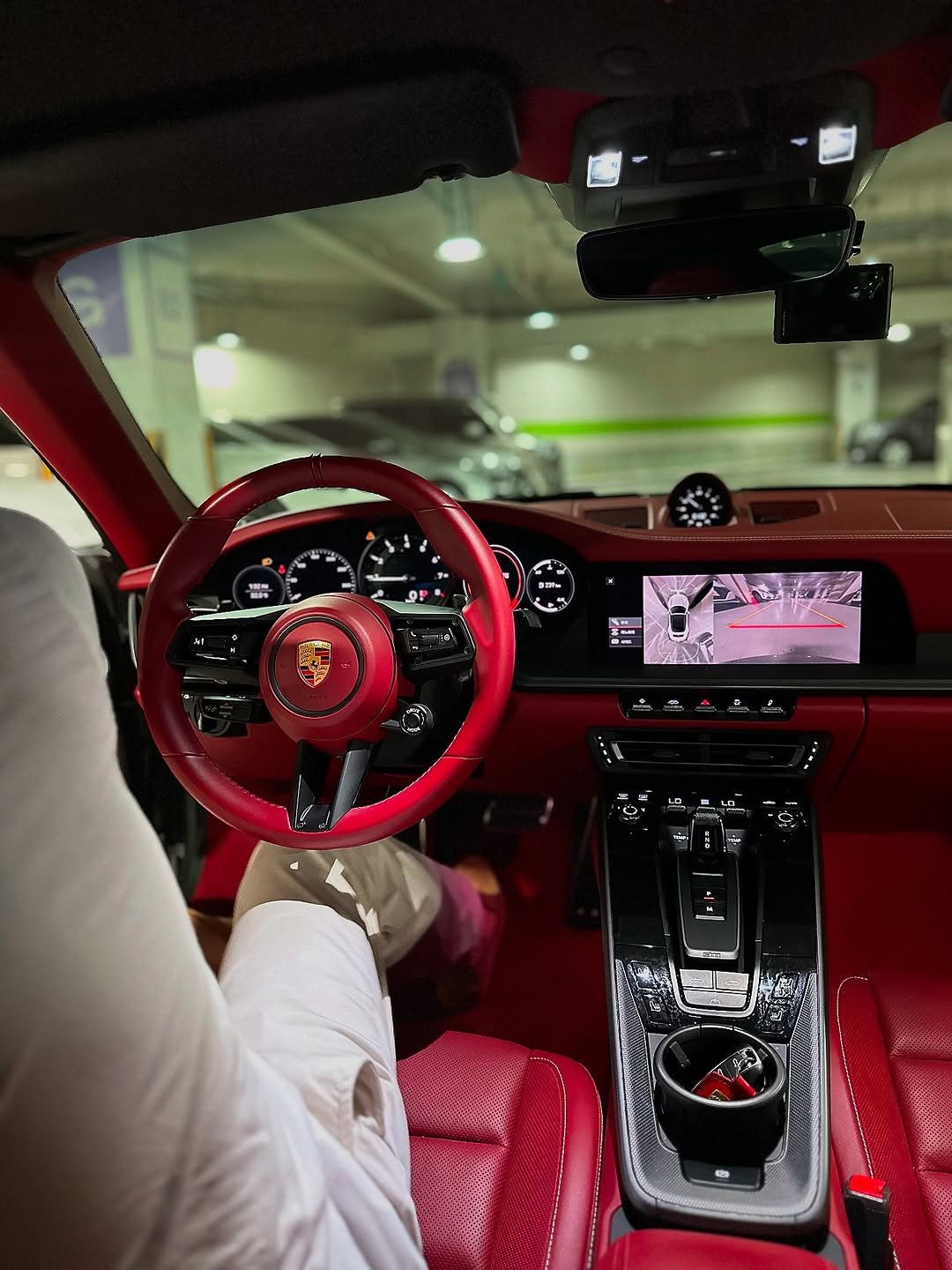 Photo by 장광기 on August 08, 2025. May be an image of 1 person, car, roadster, wheel and text.