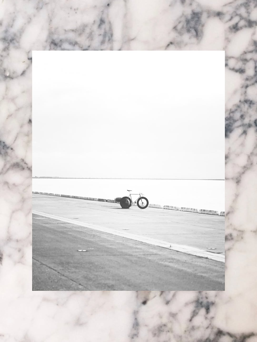 Photo by SHOTA 🟠🔵 on December 01, 2025. May be a black-and-white image of bicycle, scooter and text.