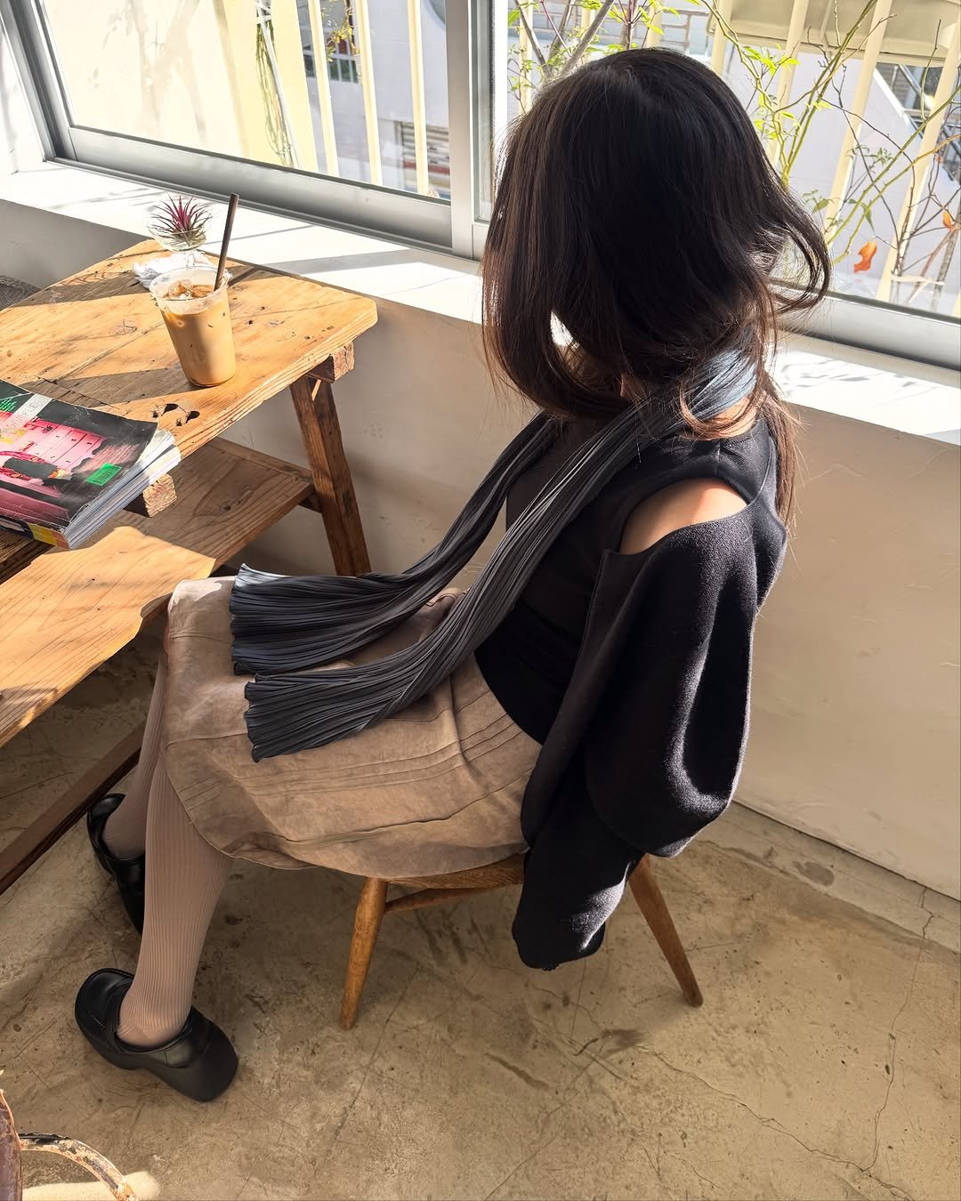 Photo by COSYMOSY 코지모지 on November 27, 2025. May be an image of turtleneck, cardigan and text.