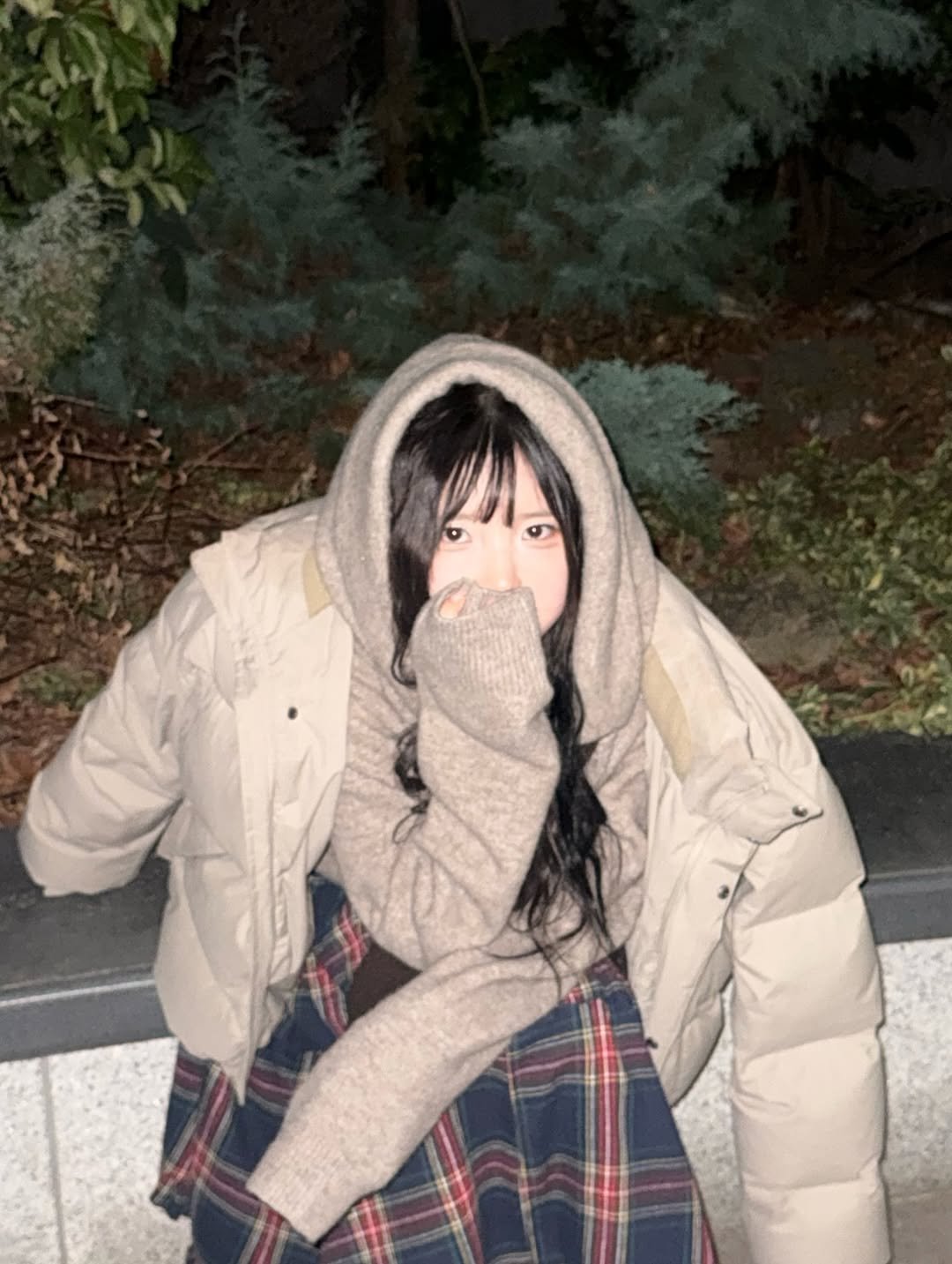 Photo by 송하영 on March 03, 2026. May be an image of duffle coat, overcoat, parka, night and text.
