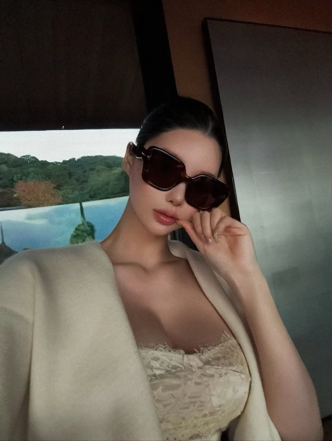 Photo by Siyoung on November 11, 2025. May be an image of one or more people, hair, makeup, slip, sunglasses and text.