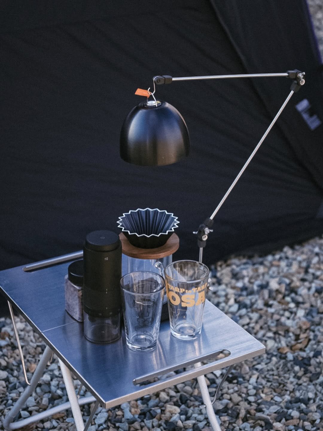 Photo shared by 🍃시기 캠프 on February 02, 2026 tagging @campingduck.official. May be an image of campsite, coffee maker, tea maker, lantern, stove, outdoors and text.