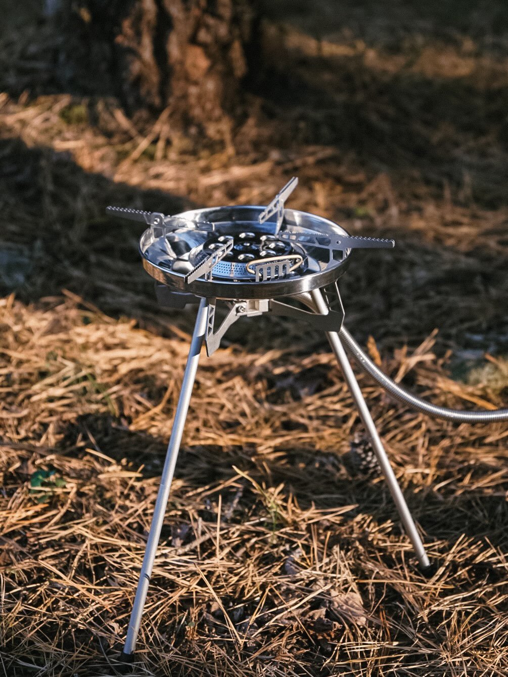 Photo shared by 🍃시기 캠프 on December 01, 2025 tagging @bellrock_official. May be an image of campsite, stove, tripod, outdoors and text.