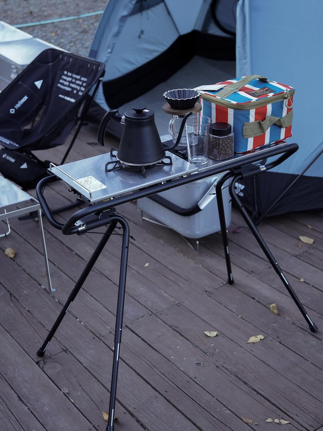 Photo shared by 🍃시기 캠프 on December 12, 2025 tagging @tokyocrafts_kr. May be an image of campsite, tripod, stove, cooker, deck chair, outdoors and text.