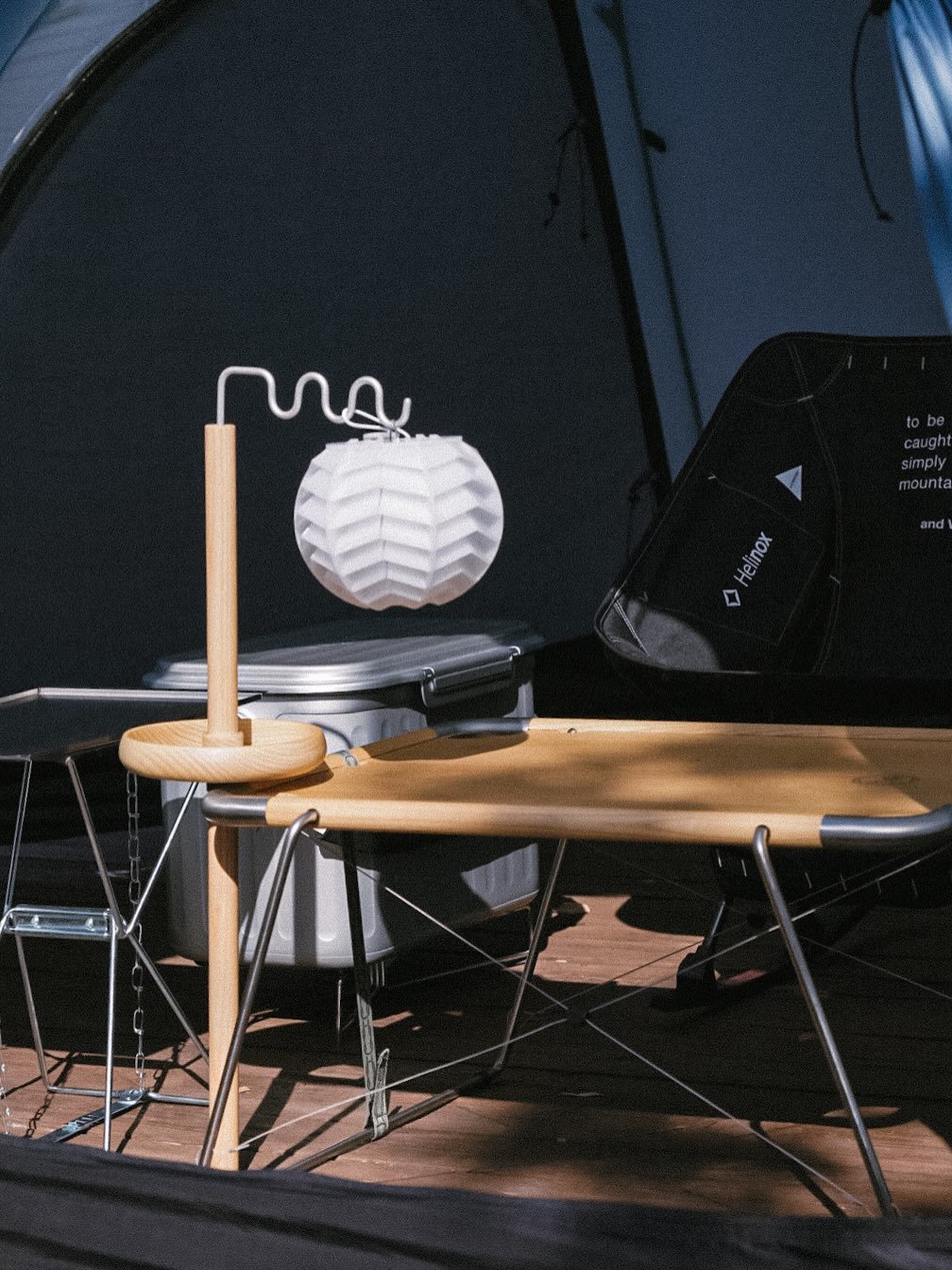 Photo by 🍃시기 캠프 on December 30, 2025. May be an image of campsite, tripod, lamp, lantern, outdoors and text.