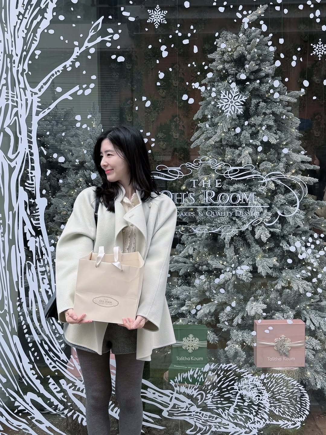 Photo shared by Eunbi Kim on December 11, 2025 tagging @theohsroom, and @talithakoum_official. May be an image of duffle coat, overcoat, purse, parka, cornflower and text.