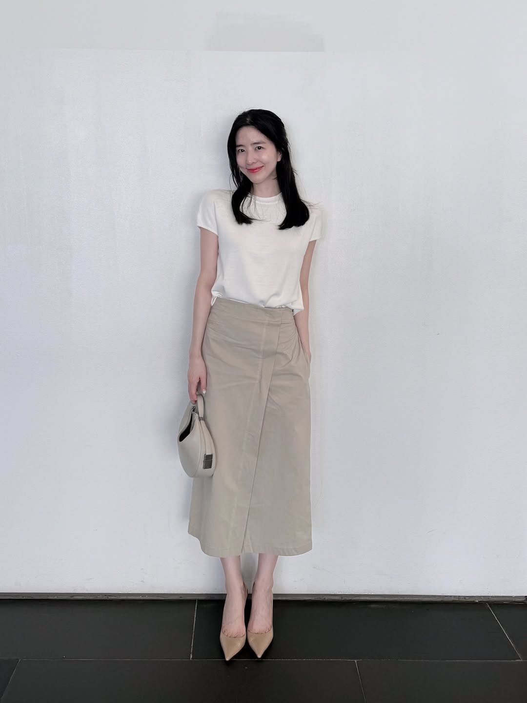 Photo shared by Eunbi Kim on August 10, 2025 tagging @atmore_official. May be an image of 1 person, top, skirt and text.