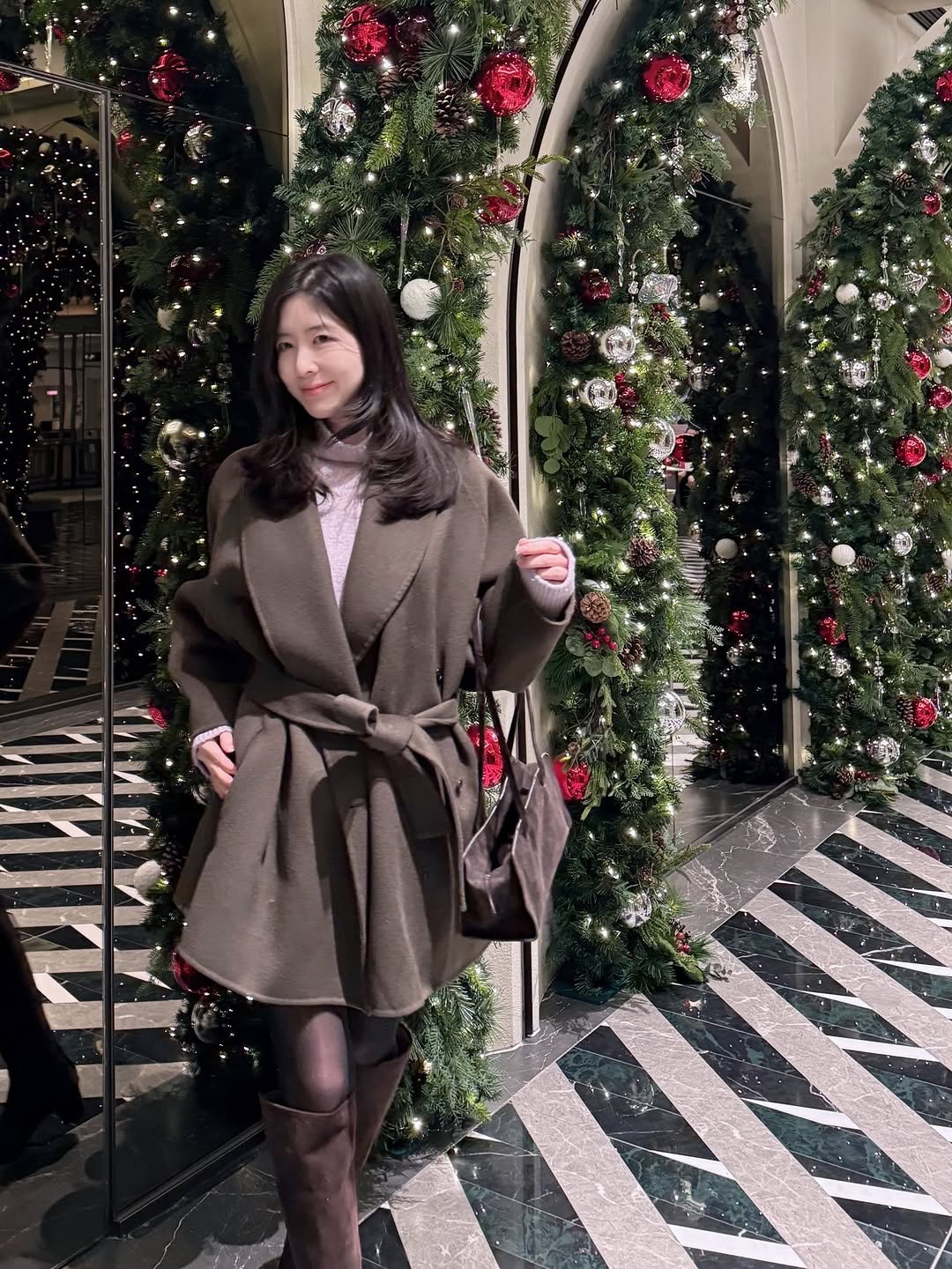 Photo by Eunbi Kim on December 23, 2025. May be an image of duffle coat, overcoat, parka, cornflower and text.