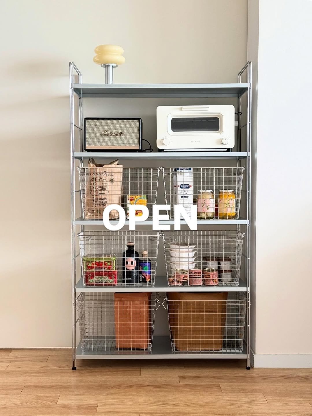 Photo by 심플팩토리 박세희 on December 30, 2025. May be an image of cart, shelf, rack, spice rack, cabinet and text.