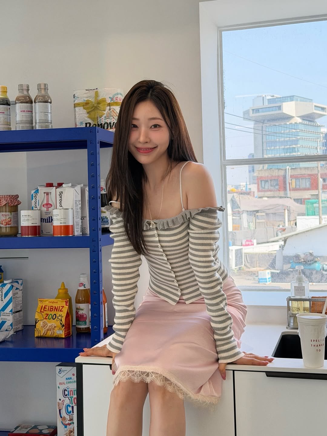 Photo by 심톨 𝐒𝐈𝐌𝐓𝐎𝐇𝐋 on April 02, 2026. May be an image of one or more people, hair, skirt, top, miniskirt, dress and text.