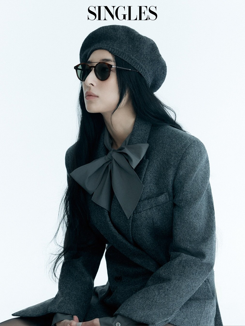 Photo shared by Singles 싱글즈 on January 07, 2026 tagging @recto_official. May be an image of one or more people, makeup, eyeglasses, blazer, magazine, coat, beret and text.