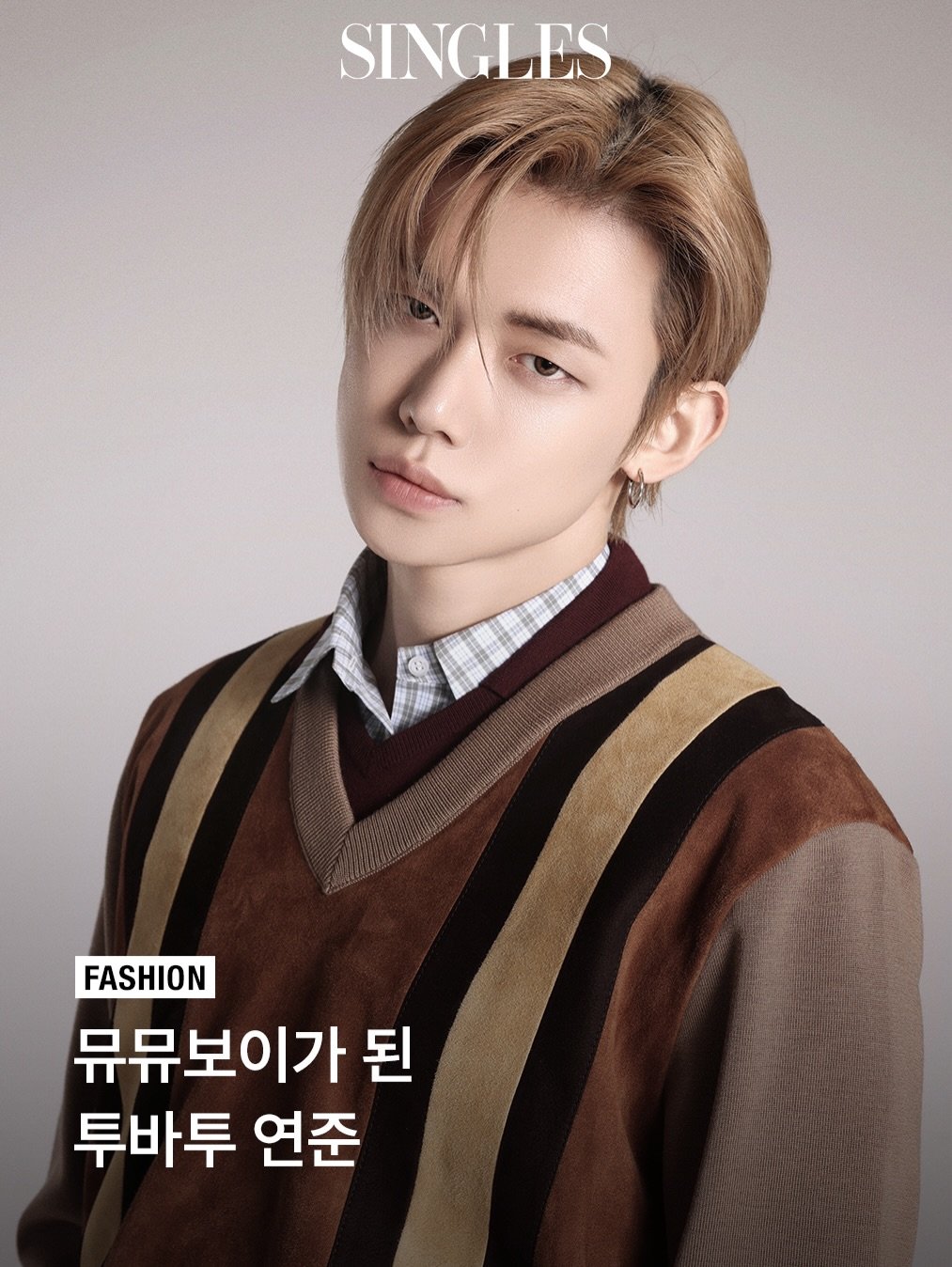 Photo shared by Singles 싱글즈 on April 27, 2026 tagging @miumiu, @txt_bighit, and @yawnzzn. May be an image of one or more people, hair, magazine, poster and text that says 'SINGLES FASHION 뮤뮤보이가 된 투바투 연준'.
