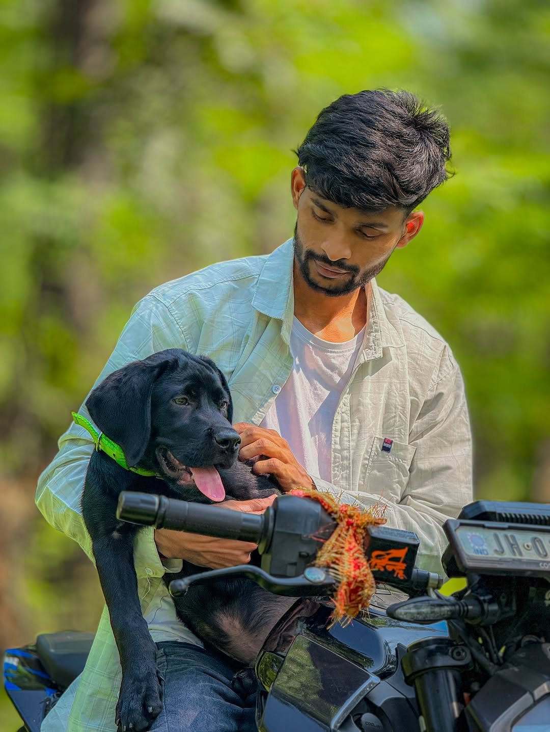 Photo by Vivek Kumar on September 28, 2025. May be an image of 1 person, Gordon setter, all-terain vehicle, outdoors and text.