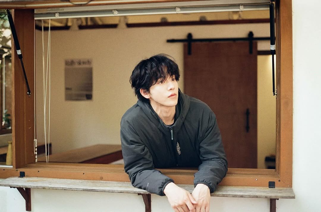 Photo shared by 남주혁 on September 26, 2025 tagging @wilsonkorea. May be an image of 1 person and text.