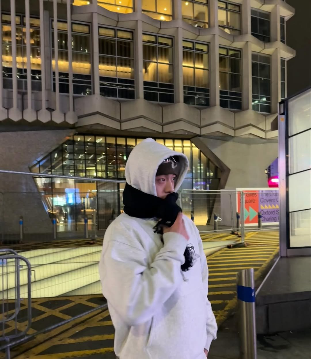 Photo by 남주혁 on October 25, 2025. May be an image of duffle coat, face mask, parka, cloak, sweatpants, night and text.