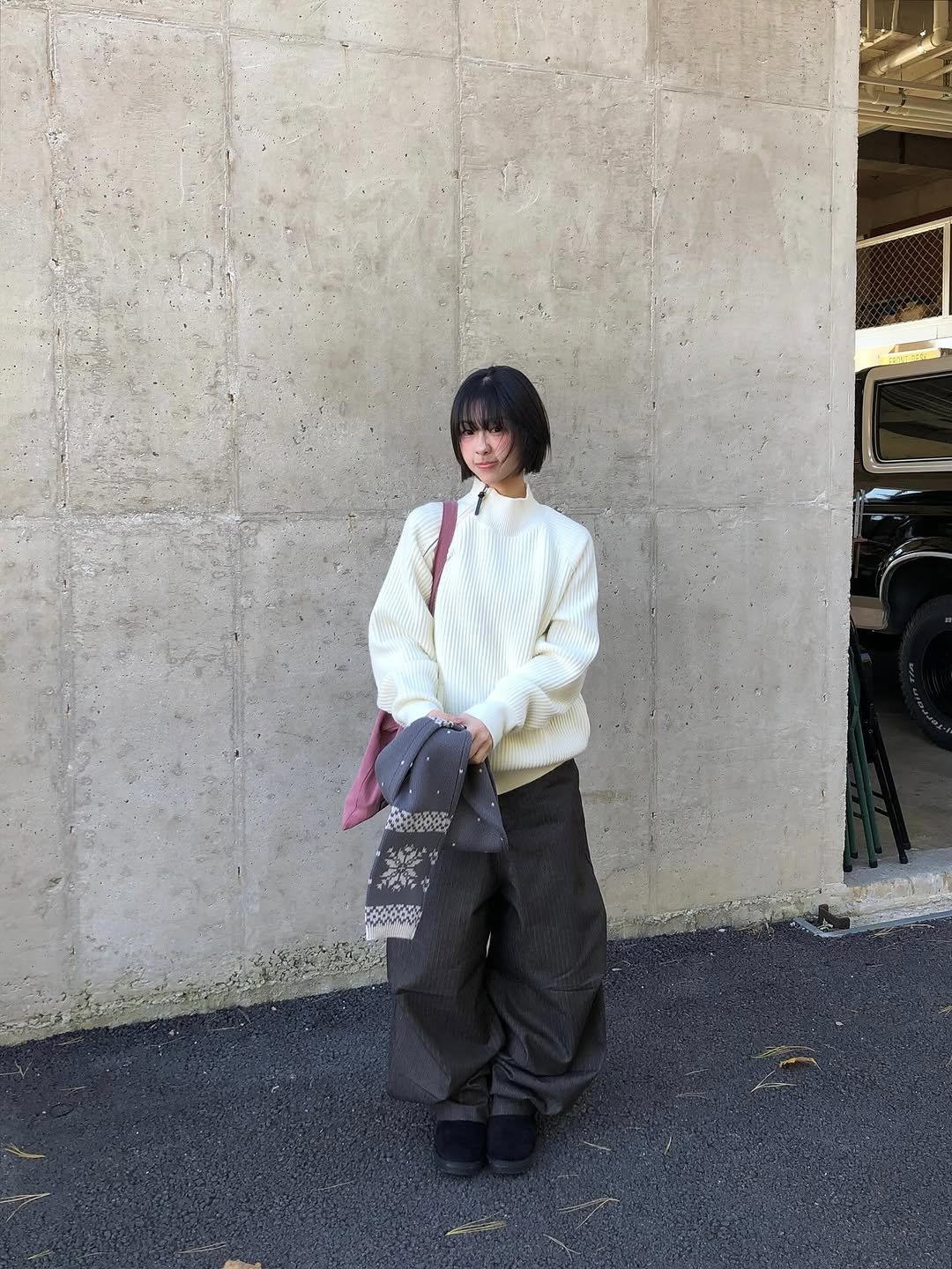 Photo by 진 / Jin on November 06, 2025. May be an image of duffle coat, tool bag, turtleneck, beret, parka and text.