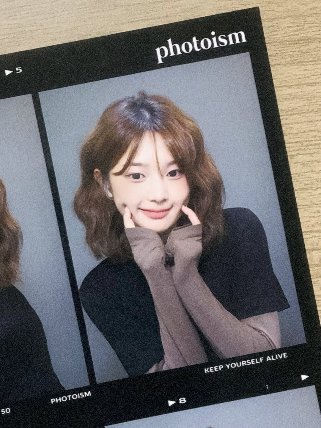 Photo shared by 김승우 on September 27, 2025 tagging @grasplan_official. May be an image of 2 people, hair and text that says '5 photoism 50 PHOTOISM PHOT OISM PHOTOISM KEEP YOURSELF PYOURSELF ALIVE'.