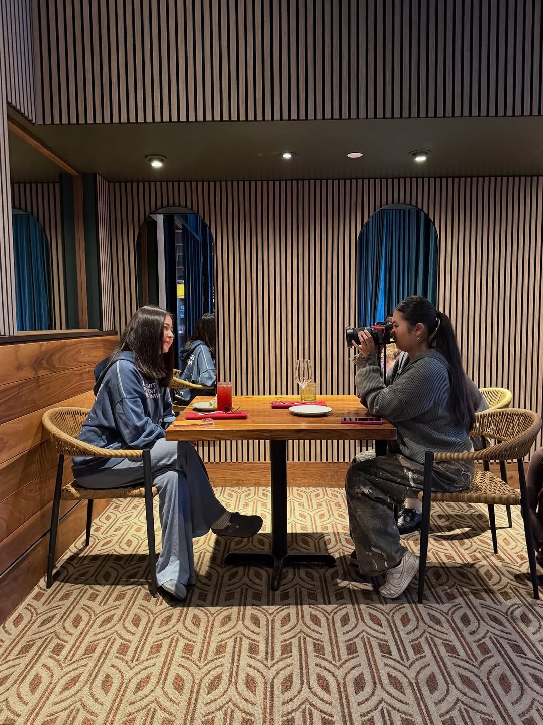 Photo shared by Sofisticated Productions on November 24, 2025 tagging @sofimanassyan. May be an image of one or more people, chess, indoors and text.