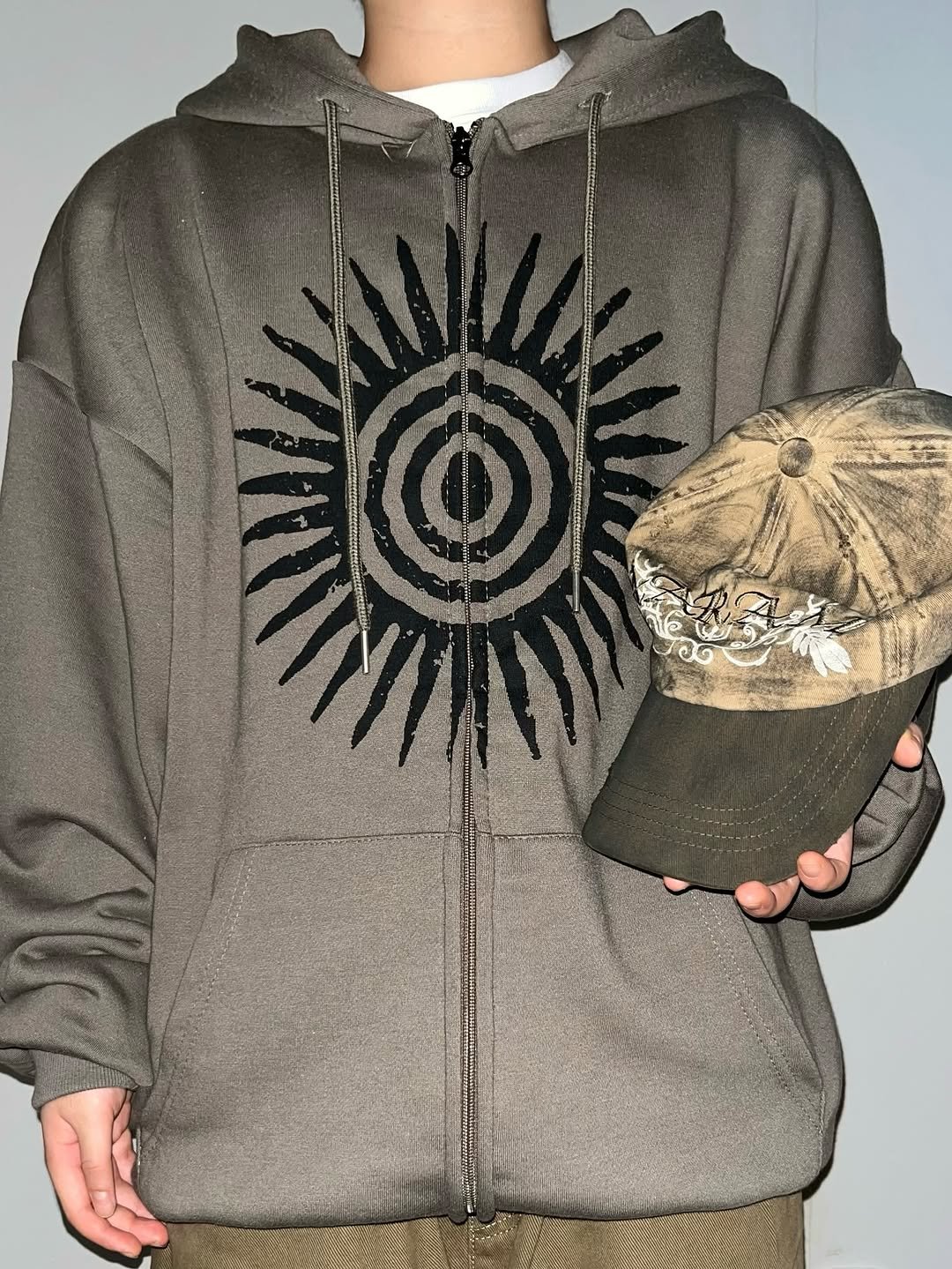 Photo by Chan / N’EST 네스트 on September 19, 2025. May be an image of 1 person, hat, fleece, parka, sweatshirt and text.