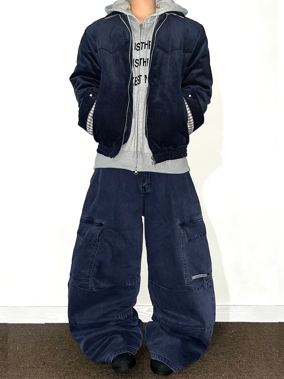 Photo shared by Chan / N’EST 네스트 on October 30, 2025 tagging @n_est.kr. May be an image of goosedown coat, sweatpants, fleece, jacket, parka and text that says 'ISTHE TES ምማግ ISTHI'.