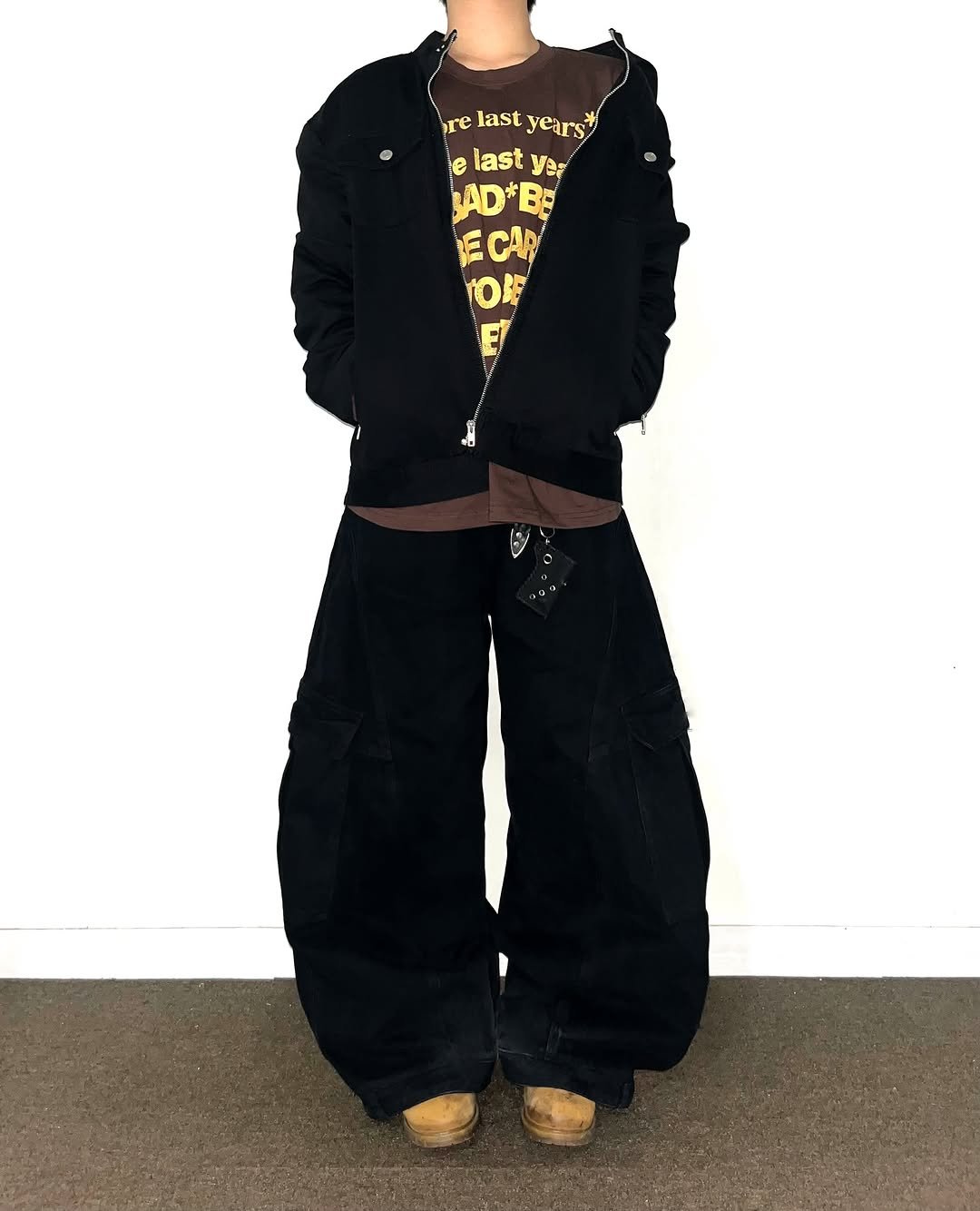 Photo shared by Chan / N’EST 네스트 on September 29, 2025 tagging @n_est.kr. May be an image of 1 person, duffle coat, parka, sweatpants and text that says 're last relastyears* years e last elastya: ye: AD*Bg ECAN ዲ'.