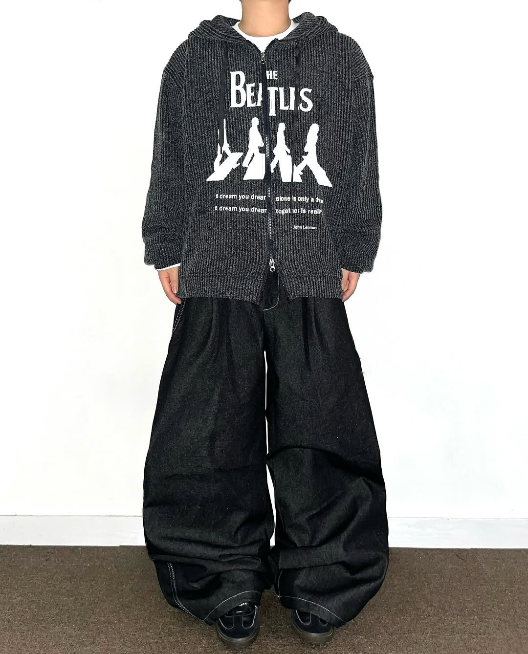 Photo shared by Chan / N’EST 네스트 on September 18, 2025 tagging @n_est.kr. May be an image of 1 person, sweatpants, drawstring, parka, sweatsuit and text.
